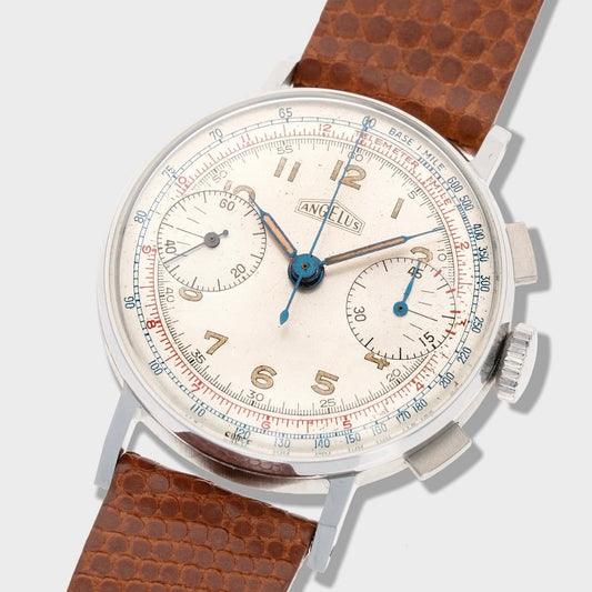 Vintage watch with a brown leather strap on a white background
