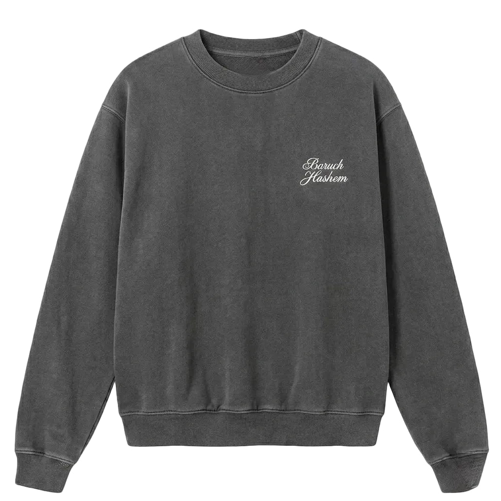 Vintage black crewneck with 'Baruch Hashem' text on a white background
