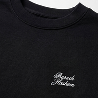 Black shirt with 'Baruch Hashem' text on a white background