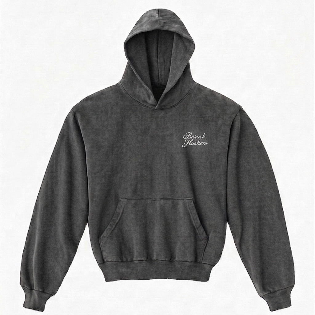 Vintage black hoodie with 'Baruch Hashem' text on a white background