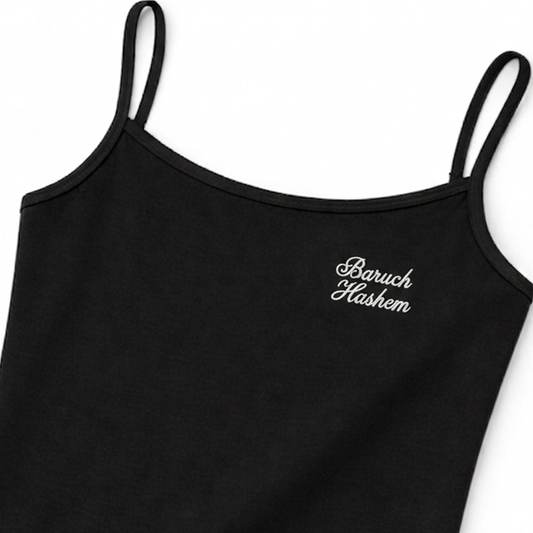 Black tank top with 'Baruch Hashem' embroidery on a white background
