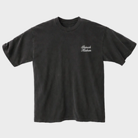 Black Shlita t-shirt with Baruch hashem script text on a white background