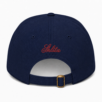 Navy blue cap with 'Shlita' embroidered on the back against a white background