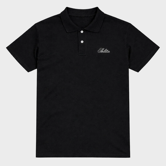 Black polo shirt with white Shlita text on a white background