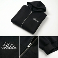 Black hoodie with 'Shlita' branding on a white background
