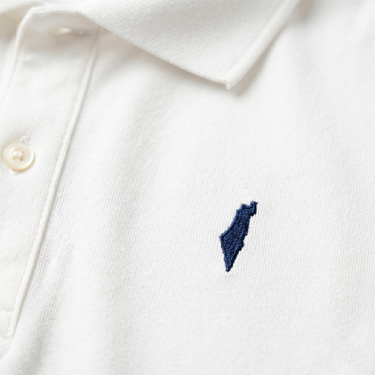 Close-up of a white polo shirt with a small blue Israel logo on a white background